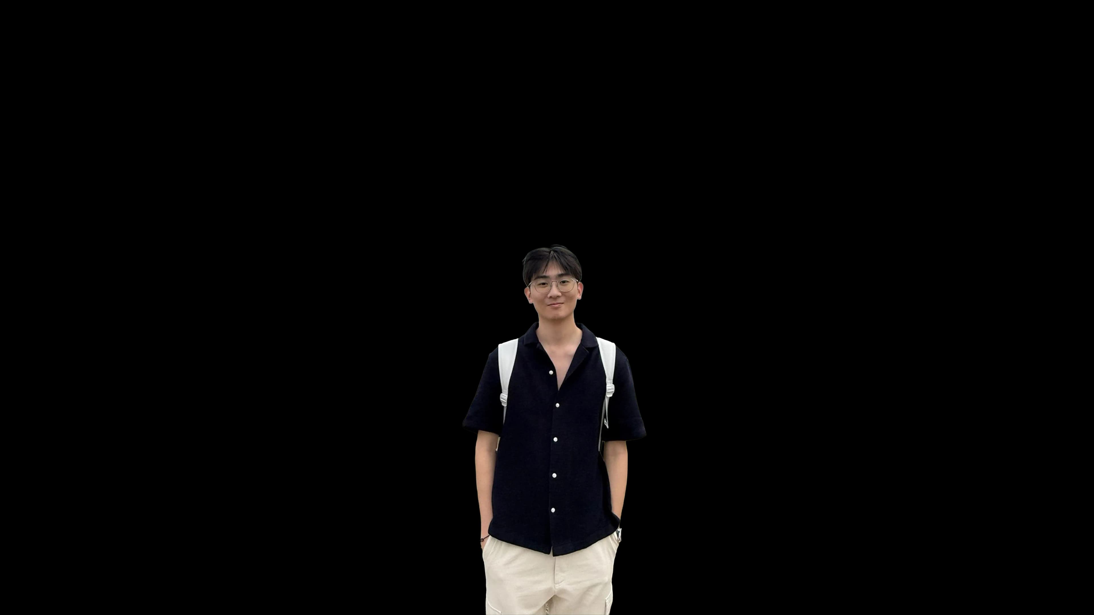 Jovan Tan standing in an open landscape